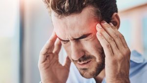 man with migraine
