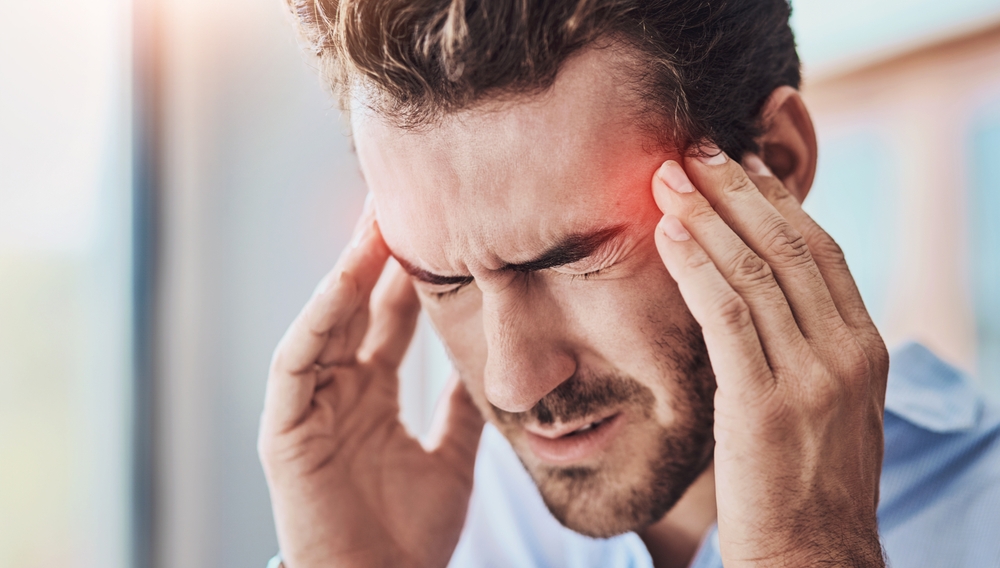 man with migraine