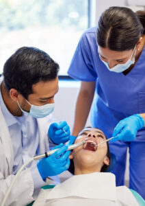 woman receiving dental cleaning